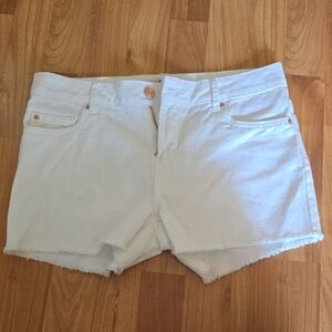 White Jean Shorts with Frayed Hem and Mid-Thigh Length